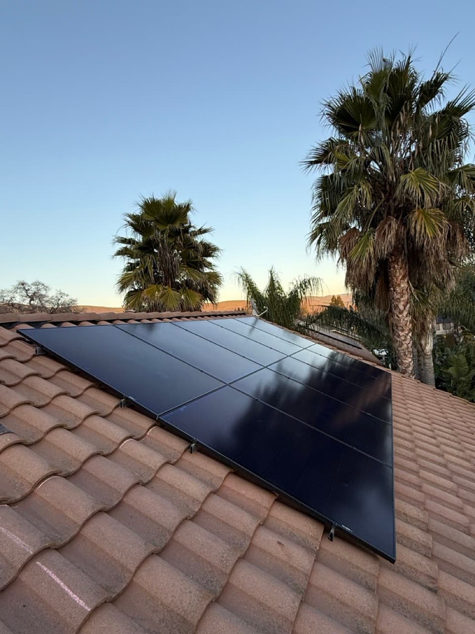 Rooftop solar array during panel maintenance.